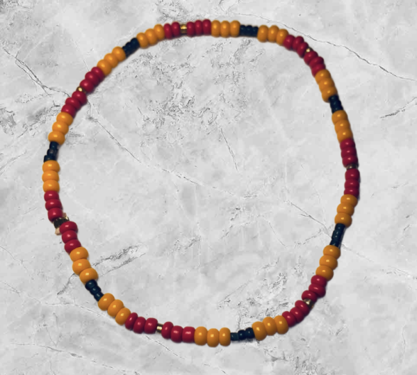Rød og orange armbånd